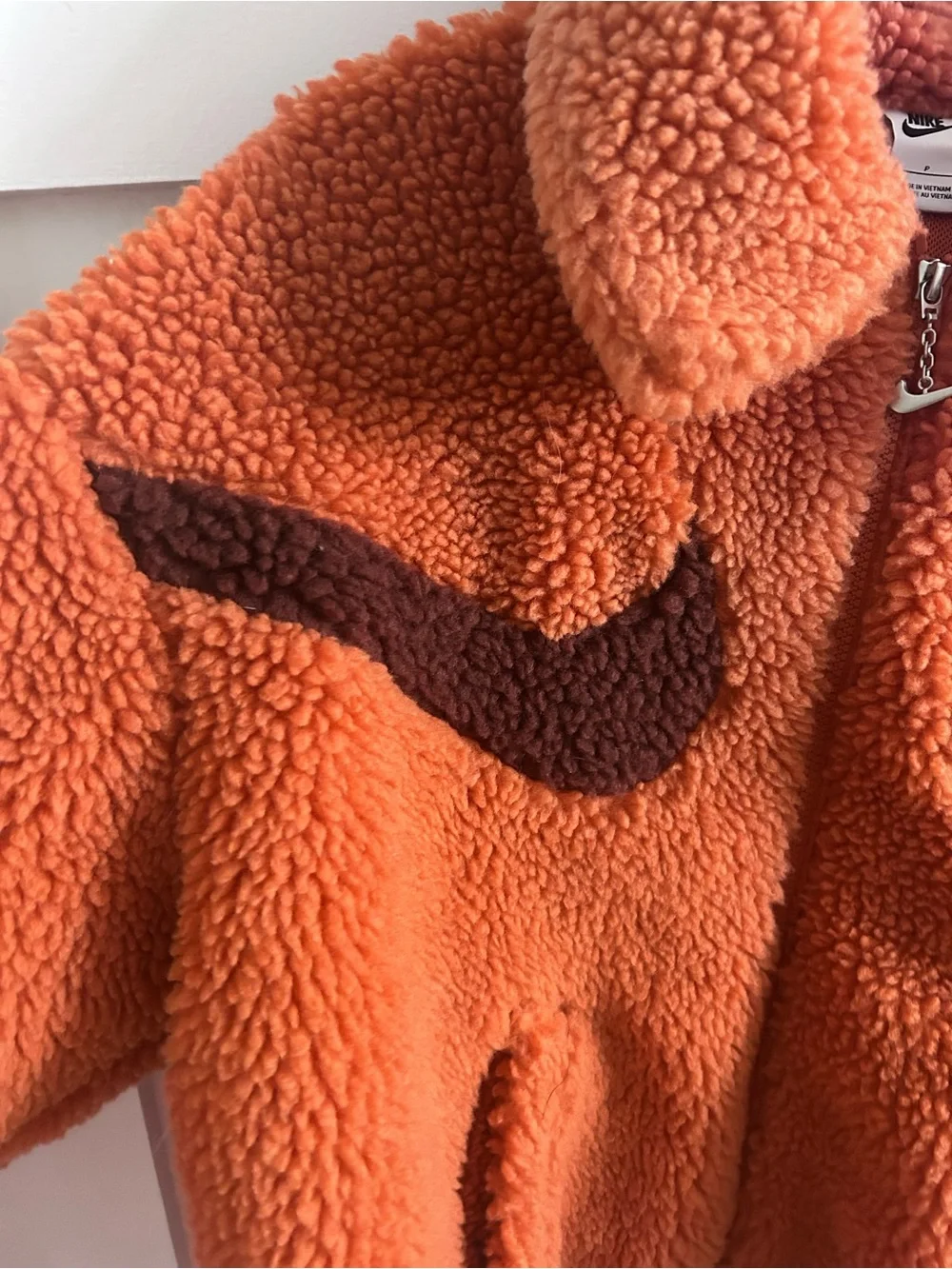 Nike Women's Sportswear Swoosh Sherpa Jacket in Lobster Crimson Small